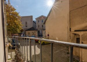 The long balconet offers a peaceful space to breathe in the old city's atmosphere