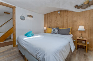 The master bedroom which can be set up as a Queen double or two single beds