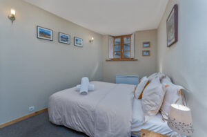 A sweet double bedroom offering a peaceful night's sleep